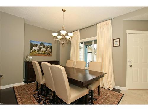 254 Cougarstone Gardens Sw, Calgary, AB - Indoor Photo Showing Dining Room