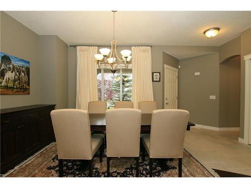 254 Cougarstone Gardens Sw, Calgary, AB - Indoor Photo Showing Dining Room