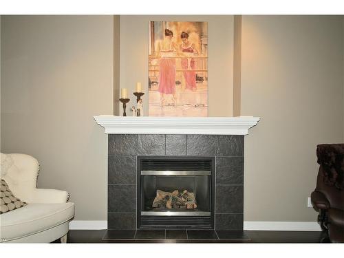 254 Cougarstone Gardens Sw, Calgary, AB - Indoor Photo Showing Living Room With Fireplace