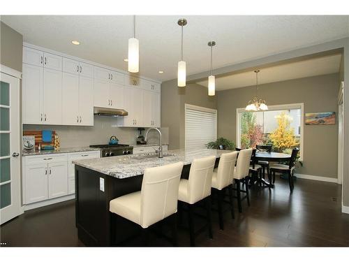 254 Cougarstone Gardens Sw, Calgary, AB - Indoor Photo Showing Kitchen With Upgraded Kitchen