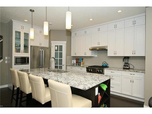 254 Cougarstone Gardens Sw, Calgary, AB - Indoor Photo Showing Kitchen With Stainless Steel Kitchen With Double Sink With Upgraded Kitchen