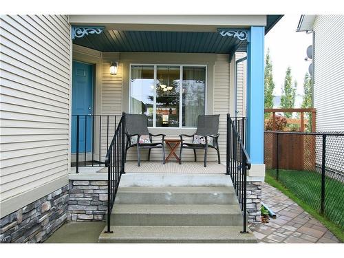 254 Cougarstone Gardens Sw, Calgary, AB - Outdoor With Deck Patio Veranda With Exterior