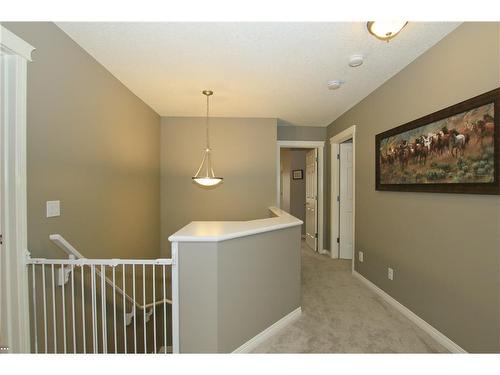 254 Cougarstone Gardens Sw, Calgary, AB - Indoor Photo Showing Other Room