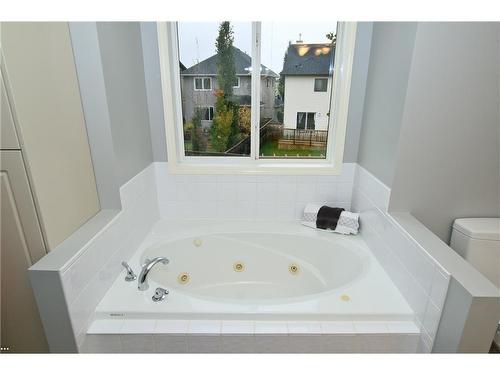 254 Cougarstone Gardens Sw, Calgary, AB - Indoor Photo Showing Bathroom