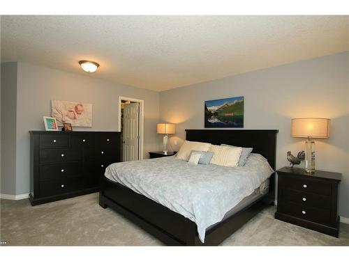 254 Cougarstone Gardens Sw, Calgary, AB - Indoor Photo Showing Bedroom