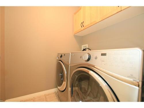 254 Cougarstone Gardens Sw, Calgary, AB - Indoor Photo Showing Laundry Room