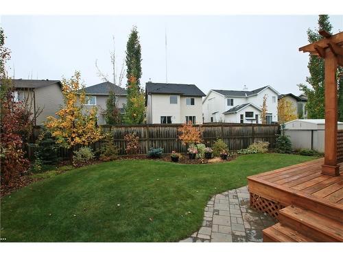 254 Cougarstone Gardens Sw, Calgary, AB - Outdoor With Backyard