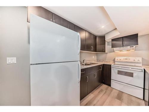 6731 Malvern Road Ne, Calgary, AB - Indoor Photo Showing Kitchen With Double Sink