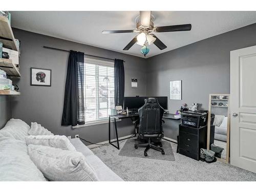 2196 Luxstone Boulevard Sw, Airdrie, AB - Indoor Photo Showing Bedroom