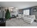 2196 Luxstone Boulevard Sw, Airdrie, AB  - Indoor Photo Showing Living Room With Fireplace 