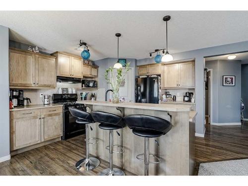 2196 Luxstone Boulevard Sw, Airdrie, AB - Indoor Photo Showing Kitchen