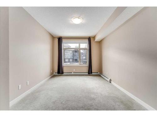 311-35 Aspenmont Heights Sw, Calgary, AB - Indoor Photo Showing Other Room