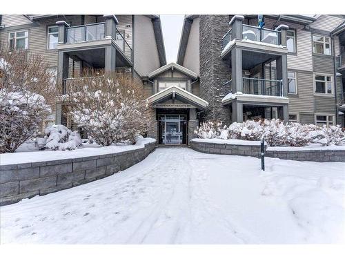 311-35 Aspenmont Heights Sw, Calgary, AB - Outdoor With Balcony With Facade