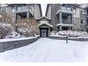 311-35 Aspenmont Heights Sw, Calgary, AB  - Outdoor With Balcony With Facade 