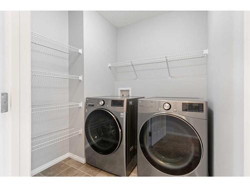 108 Heartland Way, Cochrane, AB - Indoor Photo Showing Laundry Room