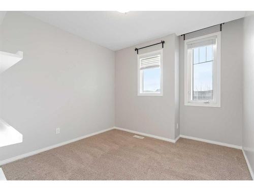 108 Heartland Way, Cochrane, AB - Indoor Photo Showing Other Room