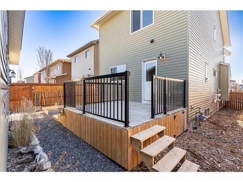 108 Heartland Way, Cochrane, AB - Outdoor With Deck Patio Veranda With Exterior