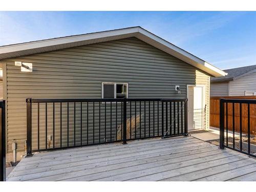 108 Heartland Way, Cochrane, AB - Outdoor With Deck Patio Veranda With Exterior