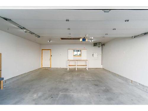 108 Heartland Way, Cochrane, AB - Indoor Photo Showing Garage