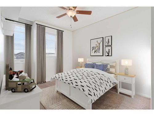 108 Heartland Way, Cochrane, AB - Indoor Photo Showing Bedroom