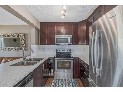 232 Pantego Lane Nw, Calgary, AB - Indoor Photo Showing Kitchen With Stainless Steel Kitchen With Double Sink