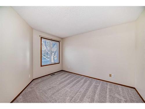 13 Arbour Cliff Close Nw, Calgary, AB - Indoor Photo Showing Other Room