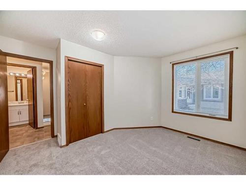 13 Arbour Cliff Close Nw, Calgary, AB - Indoor Photo Showing Other Room