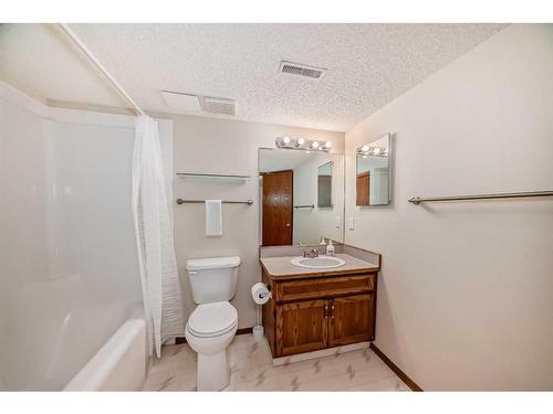 13 Arbour Cliff Close Nw, Calgary, AB - Indoor Photo Showing Bathroom