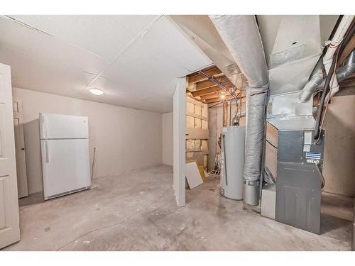 13 Arbour Cliff Close Nw, Calgary, AB - Indoor Photo Showing Basement