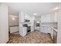 13 Arbour Cliff Close Nw, Calgary, AB  - Indoor Photo Showing Kitchen With Stainless Steel Kitchen 