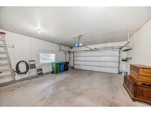 13 Arbour Cliff Close Nw, Calgary, AB - Indoor Photo Showing Garage