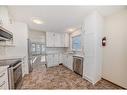 13 Arbour Cliff Close Nw, Calgary, AB  - Indoor Photo Showing Kitchen With Stainless Steel Kitchen 