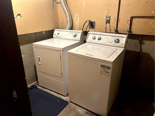 47 Falchurch Road Ne, Calgary, AB - Indoor Photo Showing Laundry Room