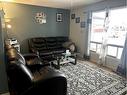 47 Falchurch Road Ne, Calgary, AB  - Indoor Photo Showing Living Room 