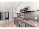 409-730 2Nd Avenue Sw, Calgary, AB  - Indoor Photo Showing Kitchen With Upgraded Kitchen 