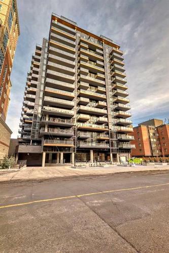 409-730 2Nd Avenue Sw, Calgary, AB - Outdoor With Balcony With Facade