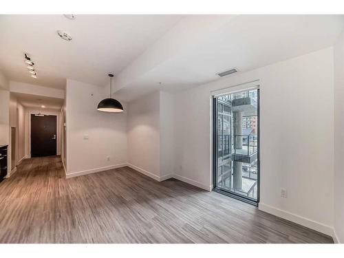 409-730 2Nd Avenue Sw, Calgary, AB - Indoor Photo Showing Other Room With Fireplace