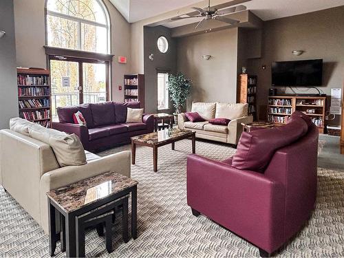 110-60 Sierra Morena Landing Sw, Calgary, AB - Indoor Photo Showing Living Room