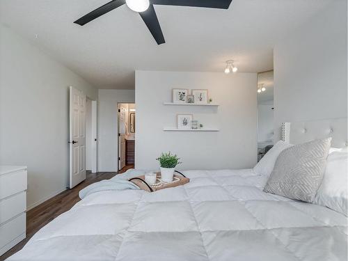 10 Crystalridge Way, Okotoks, AB - Indoor Photo Showing Bedroom