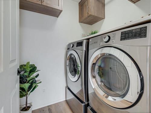 10 Crystalridge Way, Okotoks, AB - Indoor Photo Showing Laundry Room