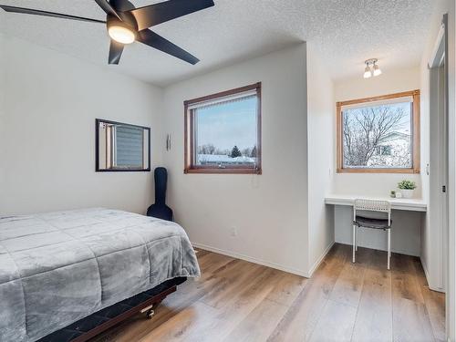 10 Crystalridge Way, Okotoks, AB - Indoor Photo Showing Bedroom