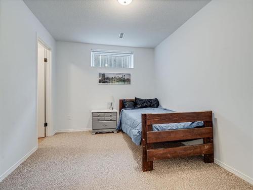 10 Crystalridge Way, Okotoks, AB - Indoor Photo Showing Bedroom