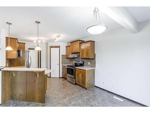 48 Eversyde Manor Sw, Calgary, AB - Indoor Photo Showing Kitchen