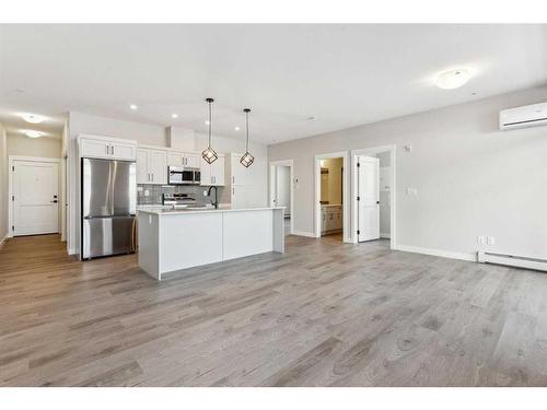 1203-200 Seton Circle Se, Calgary, AB - Indoor Photo Showing Kitchen