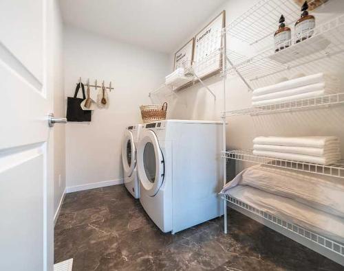 467 Tekarra Drive Nw, Calgary, AB - Indoor Photo Showing Laundry Room