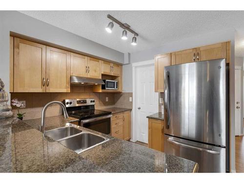 67 Country Village Lane Ne, Calgary, AB - Indoor Photo Showing Kitchen With Stainless Steel Kitchen