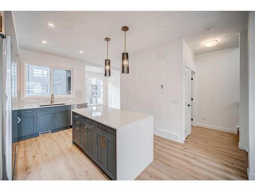 43 Lucas Way Nw, Calgary, AB - Indoor Photo Showing Kitchen With Upgraded Kitchen