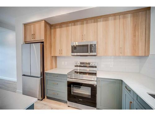 43 Lucas Way Nw, Calgary, AB - Indoor Photo Showing Kitchen