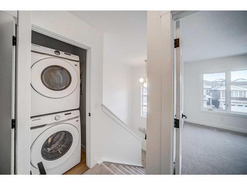 43 Lucas Way Nw, Calgary, AB - Indoor Photo Showing Laundry Room