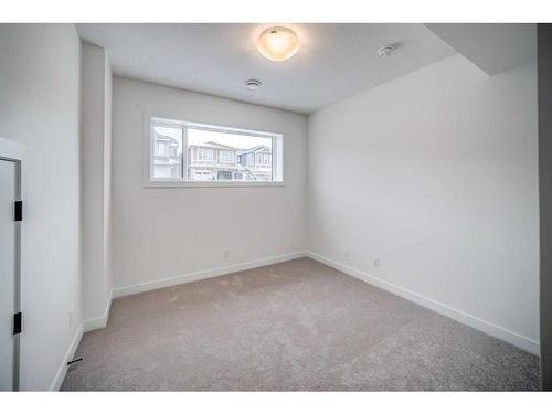 43 Lucas Way Nw, Calgary, AB - Indoor Photo Showing Other Room